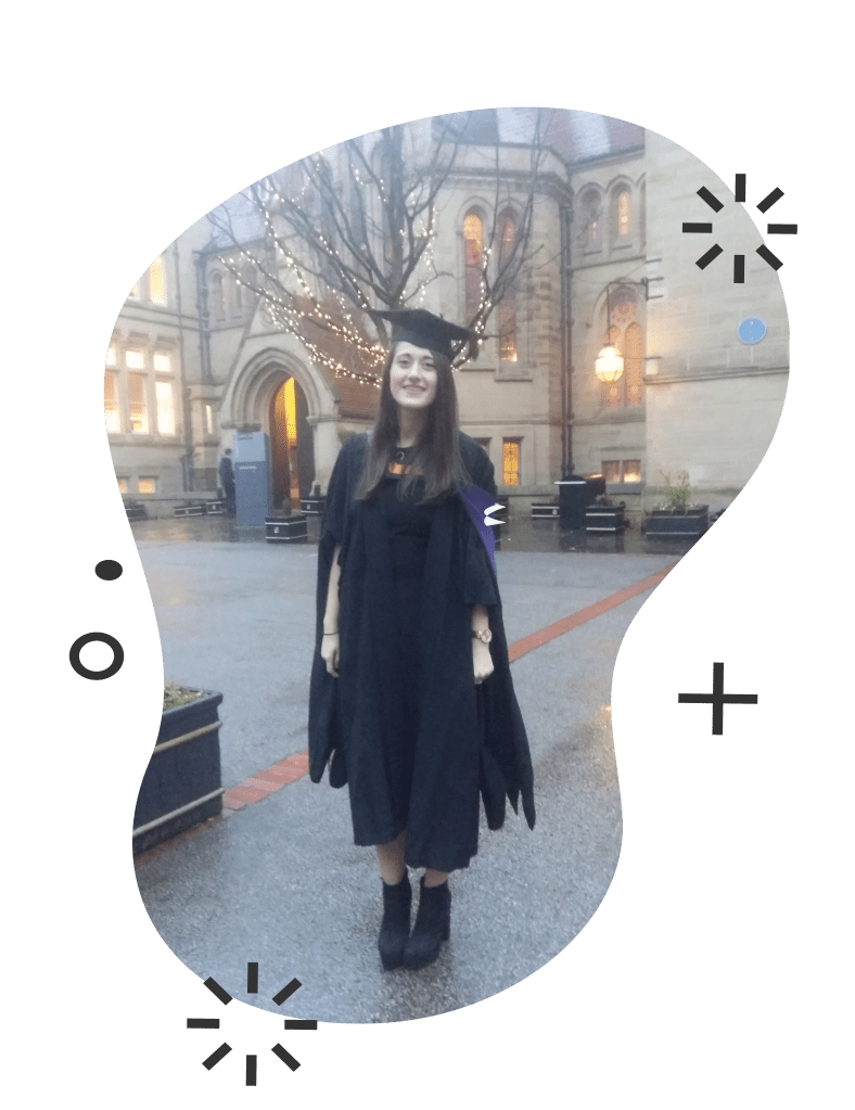 Decorative image - Irina at the graduation outside the University of Manchester